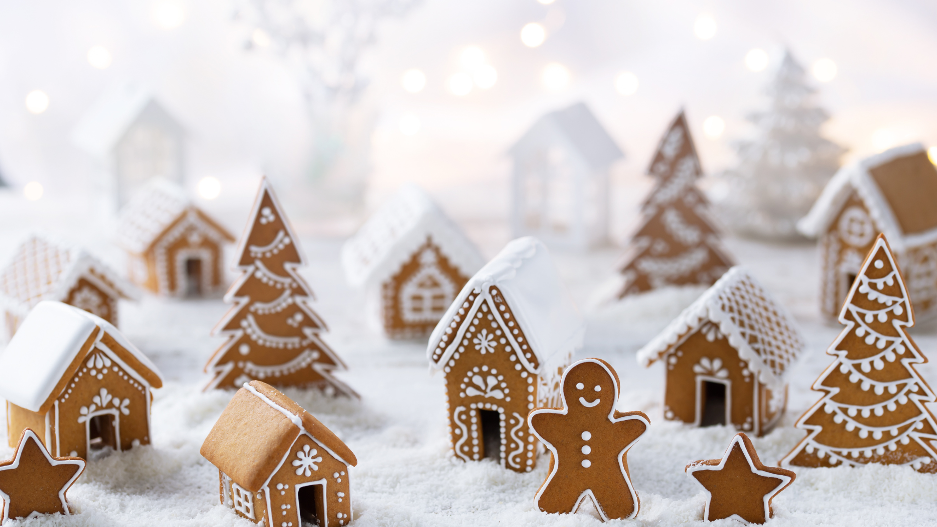 Gingerbread mean with gingerbread houses and gingerbread trees,